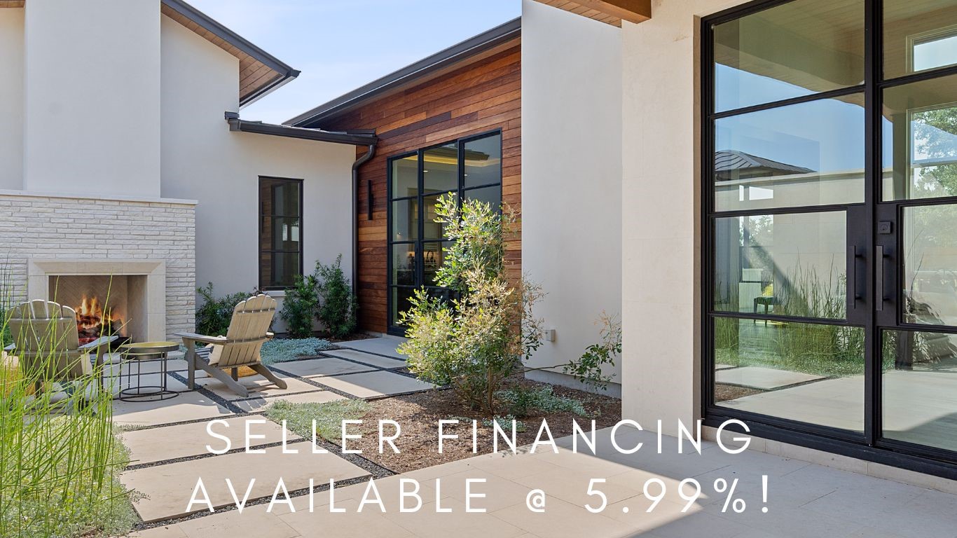 a view of a porch with chairs and potted plants