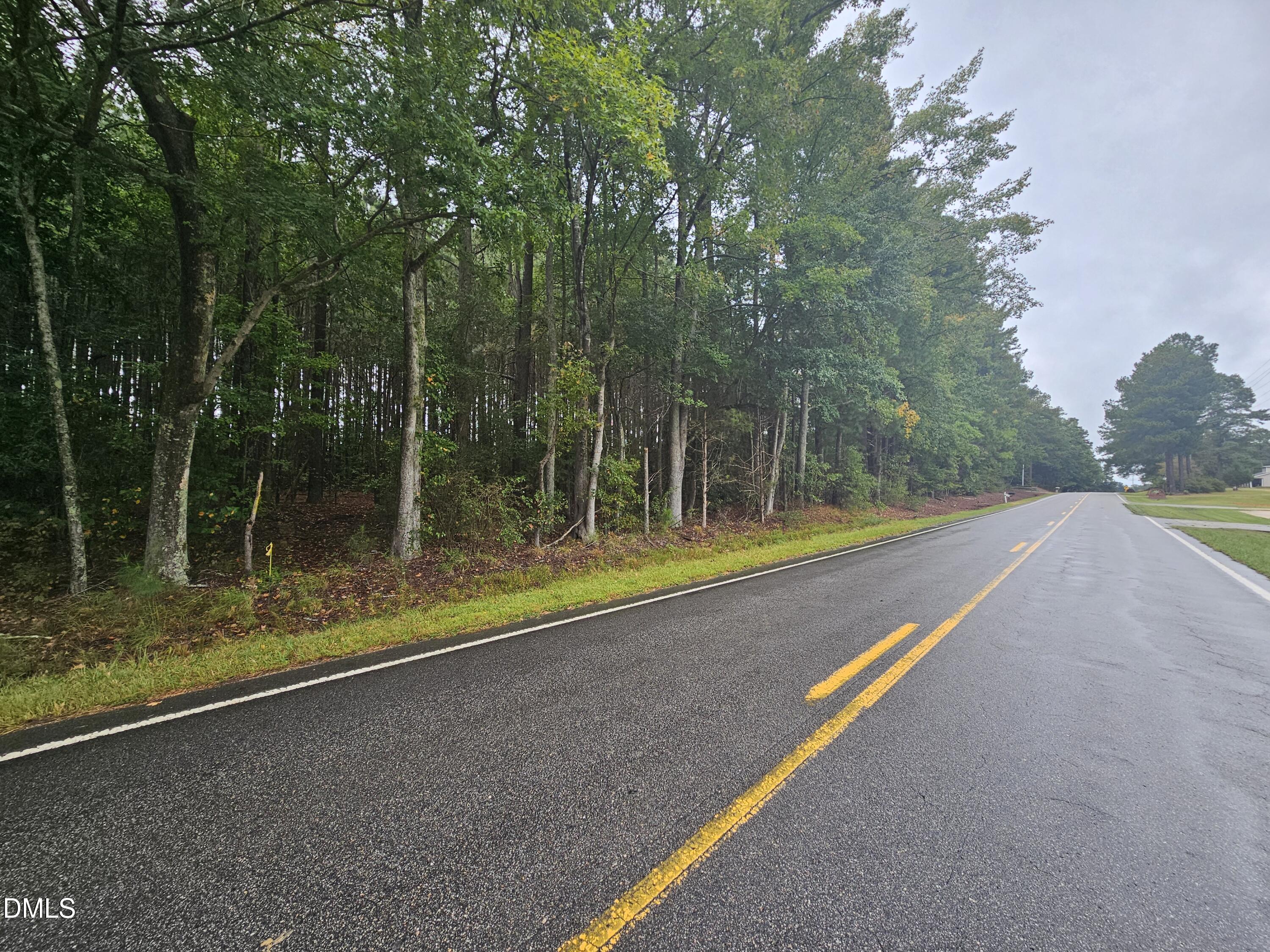 0 Nc-231 Middlesex, NC 27557 - Photo 6 of 9 a view of a yard with a large trees