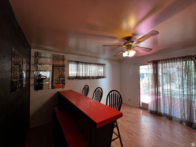338 South 300 West Helper, UT 84526 - Photo 9 of 20 Dining room with a ceiling fan and light wood-style flooring