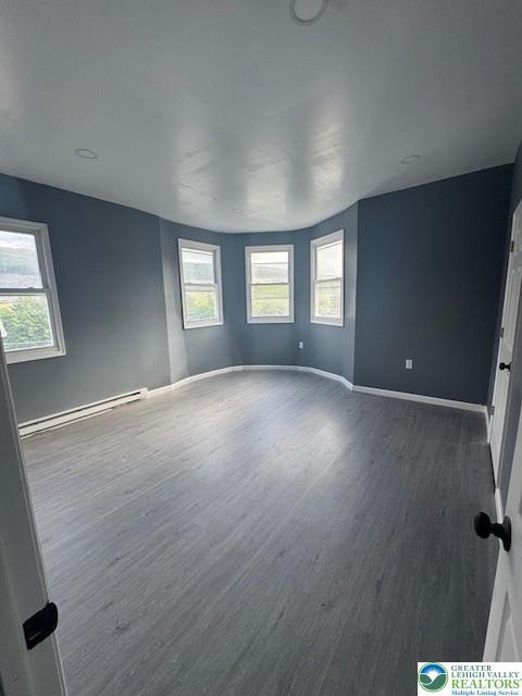 116 East Ridge Street, Unit 2 Coaldale, PA 18218 - Photo 6 of 10 wooden floor in an empty room with a window