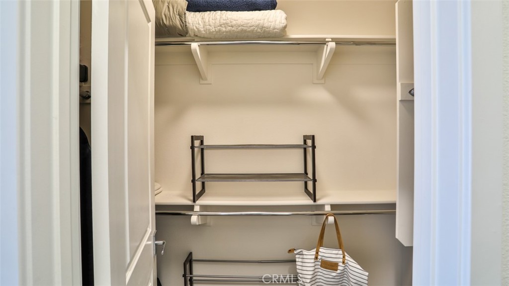 1207 Doheny Way Dana Point, CA 92629 - Photo 20 of 74 Secondary bedroom with walk-in closet and next to full hall bathroom.