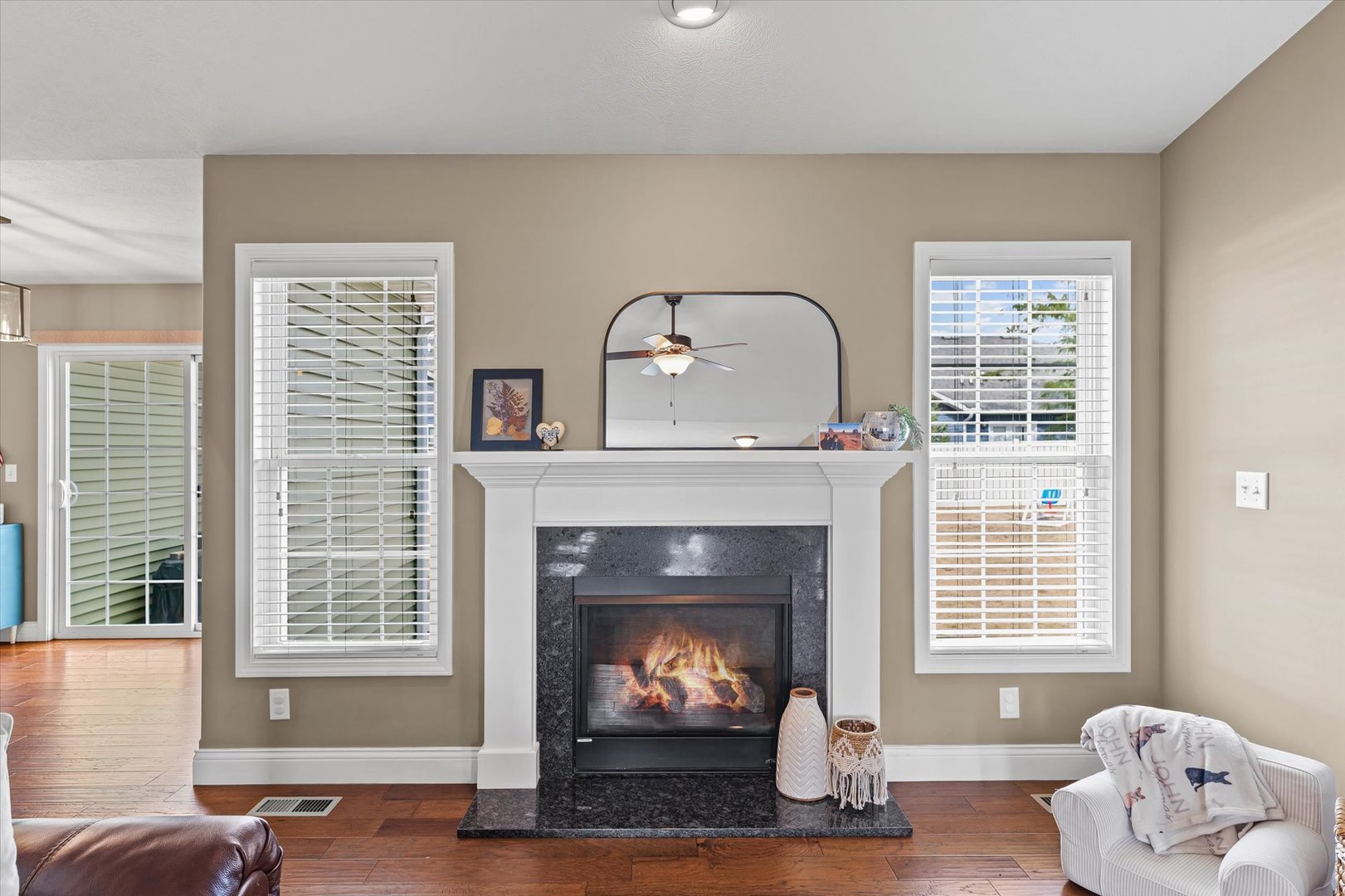 2022 Prairie Grass Lane Mahomet, IL 61853 - Photo 14 of 51 a living room with furniture and a fireplace