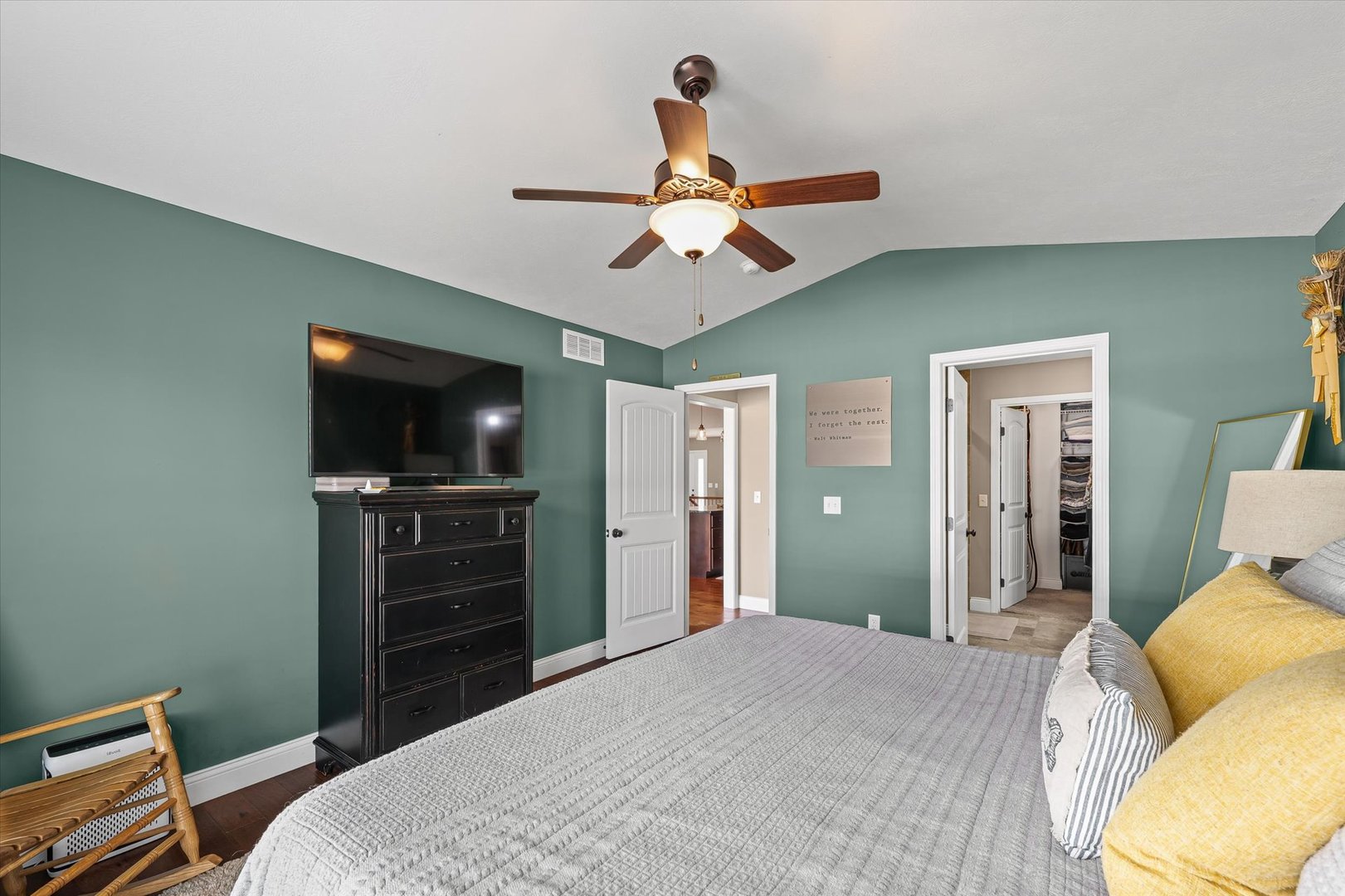 2022 Prairie Grass Lane Mahomet, IL 61853 - Photo 27 of 51 a bedroom with a bed and a flat screen tv