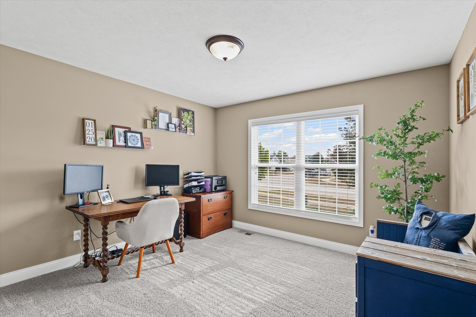 2022 Prairie Grass Lane Mahomet, IL 61853 - Photo 33 of 51 a view of a livingroom with workspace and a couch