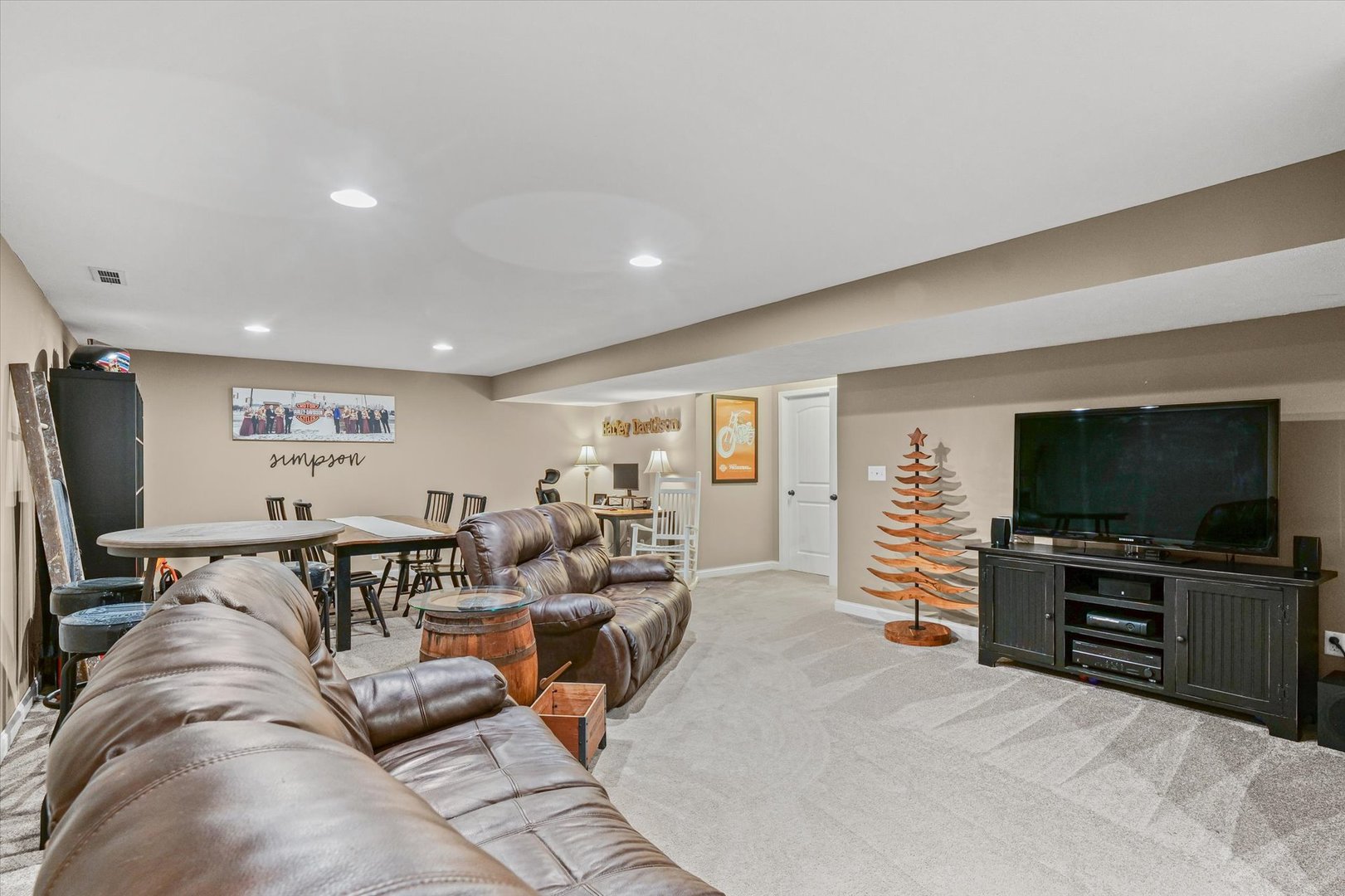 2022 Prairie Grass Lane Mahomet, IL 61853 - Photo 41 of 51 a living room with furniture and a flat screen tv
