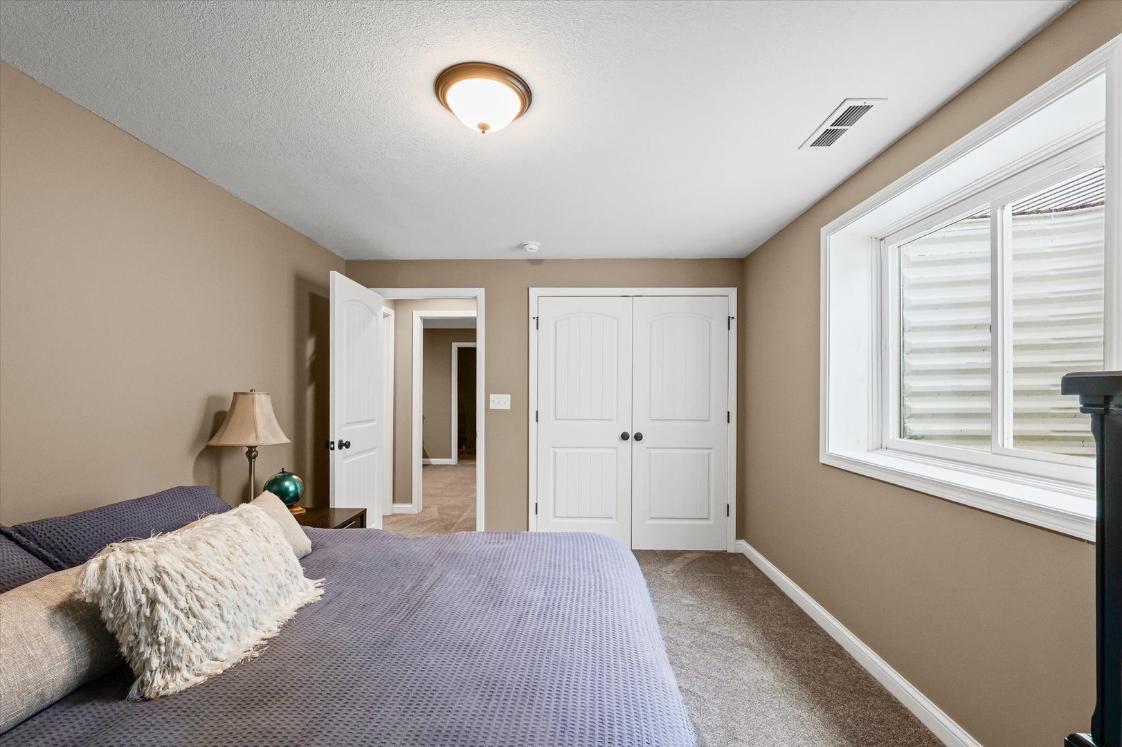 2022 Prairie Grass Lane Mahomet, IL 61853 - Photo 44 of 51 a bedroom with bed and a window