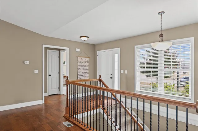 a view of a room with windows