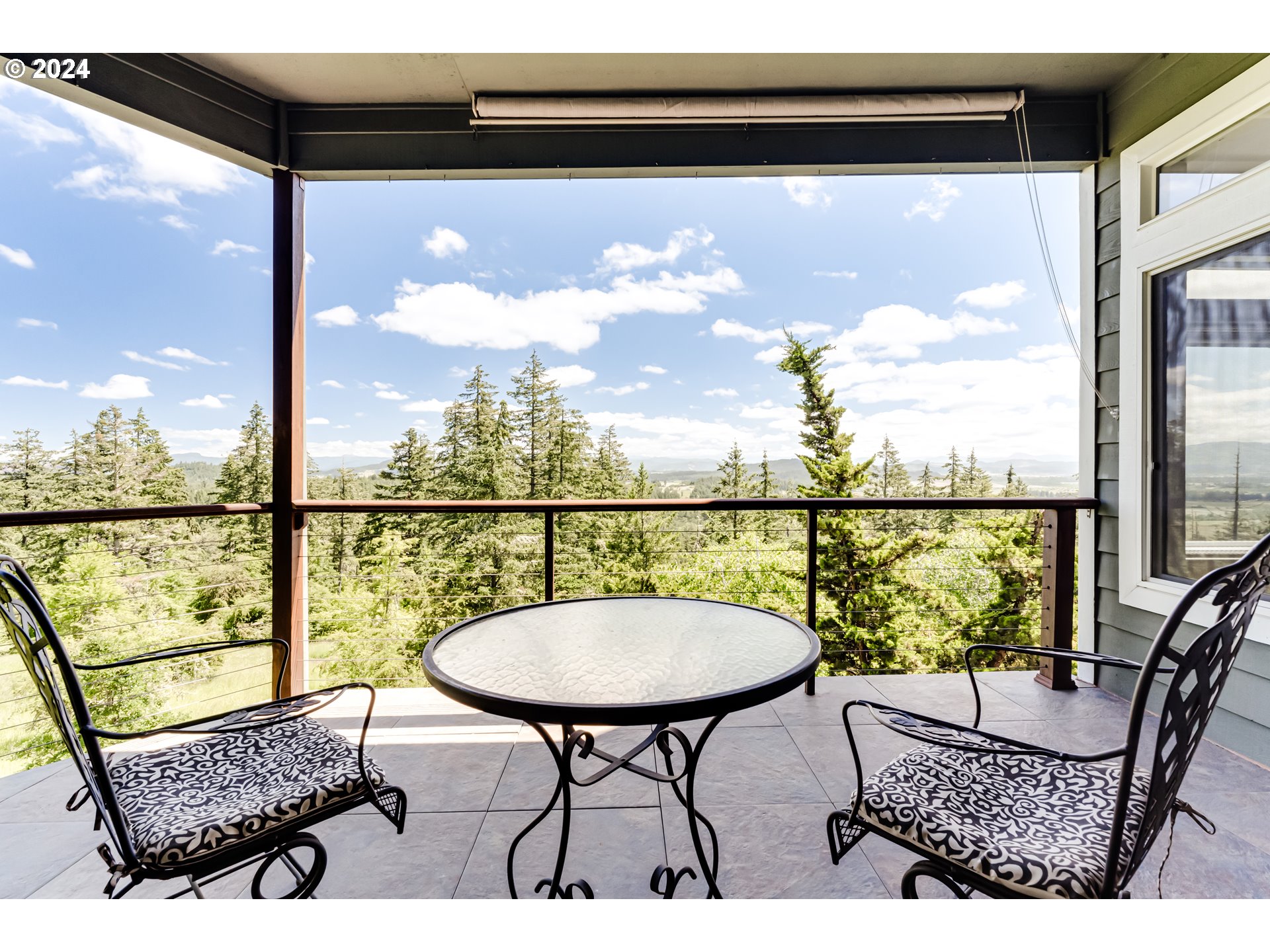 85290 Ridge Top Drive Eugene, OR 97405 - Photo 16 of 48 a view of a chairs and table in the balcony