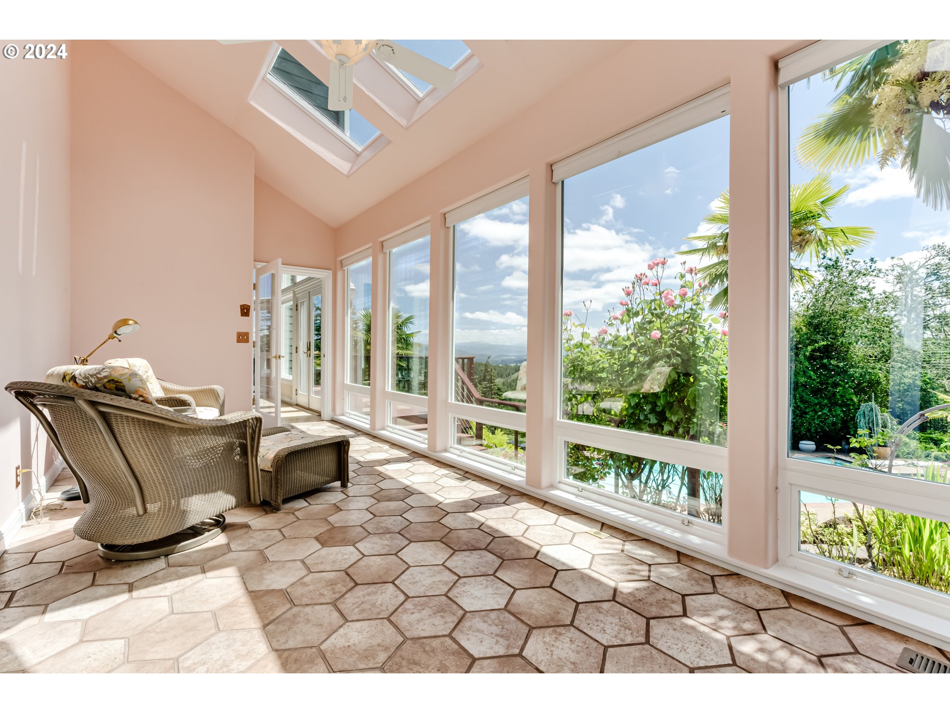 85290 Ridge Top Drive Eugene, OR 97405 - Photo 17 of 48 a living room with furniture and a floor to ceiling window