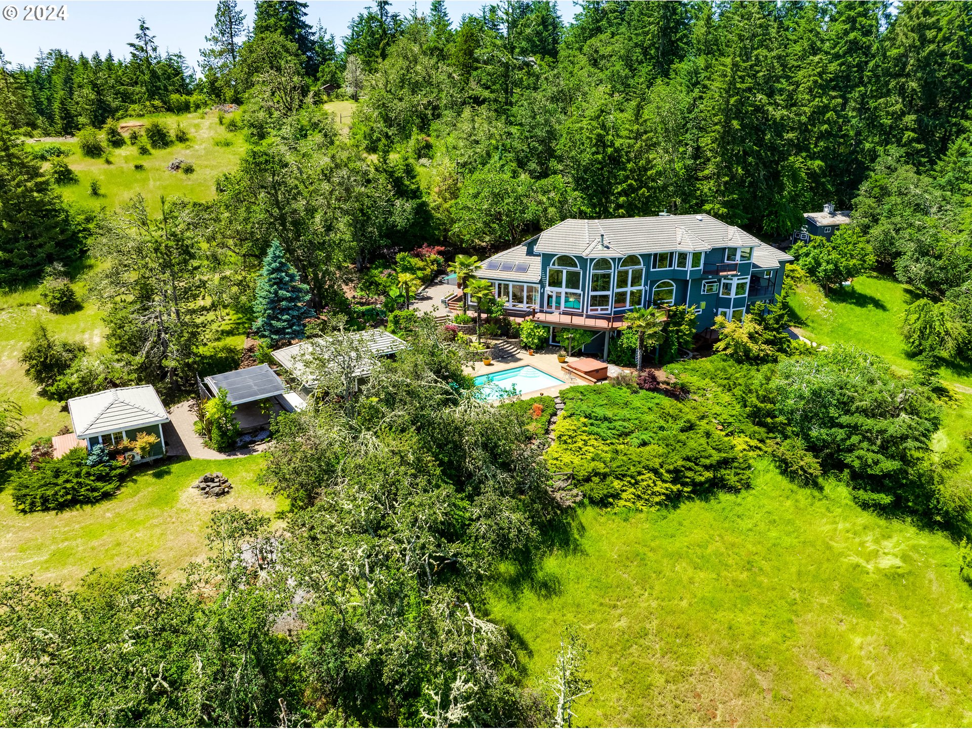 85290 Ridge Top Drive Eugene, OR 97405 - Photo 2 of 48 a aerial view of a house with a yard basket ball court and outdoor seating