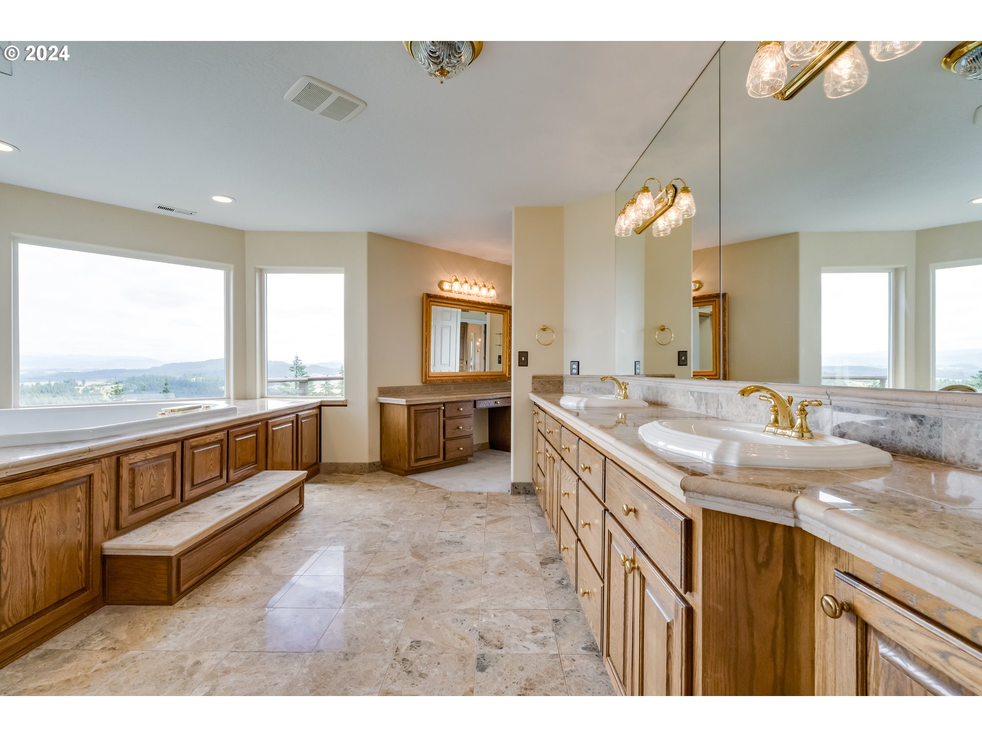85290 Ridge Top Drive Eugene, OR 97405 - Photo 27 of 48 a bathroom with a double vanity sink and a large mirror