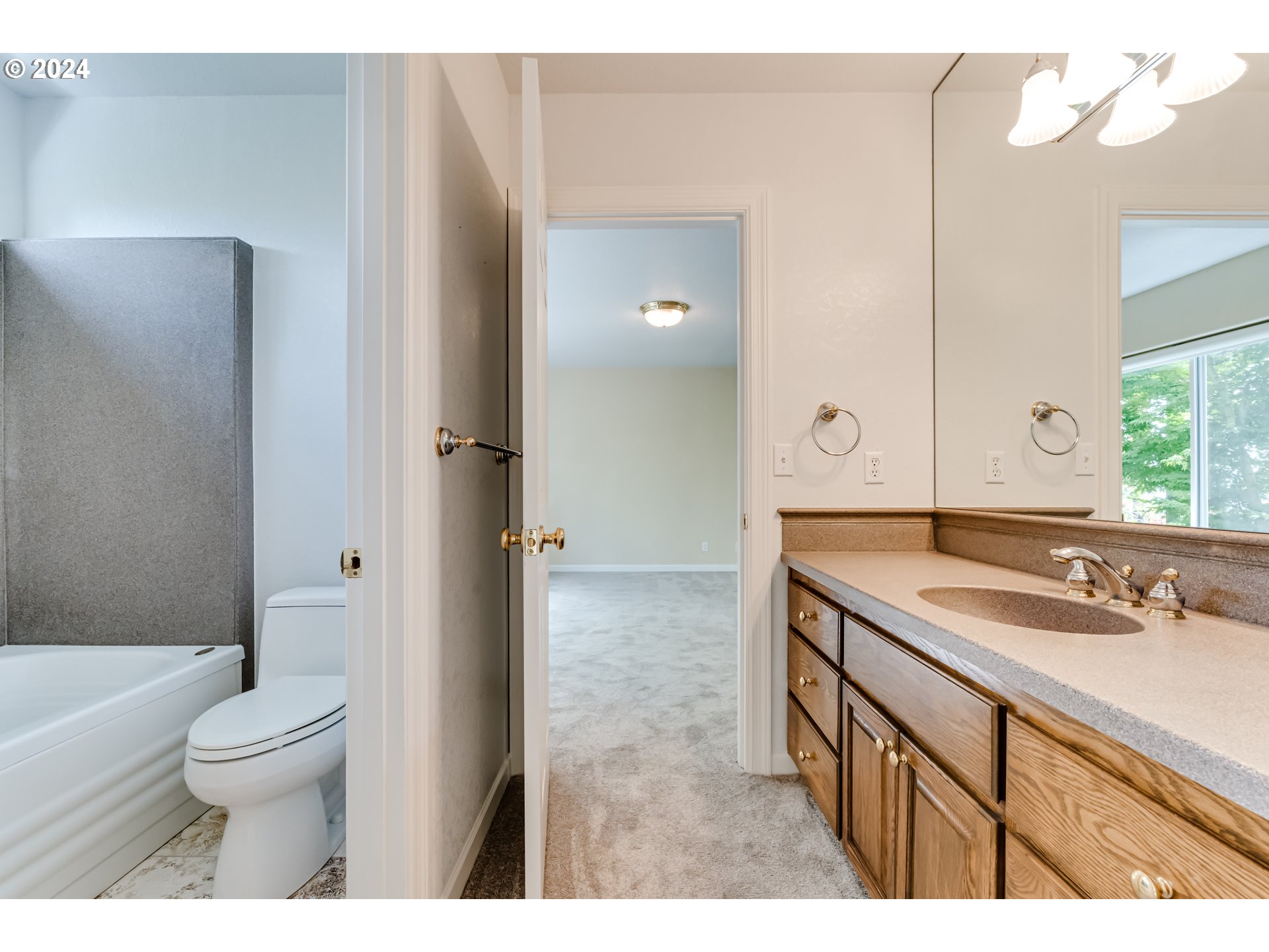 85290 Ridge Top Drive Eugene, OR 97405 - Photo 35 of 48 a bathroom with a sink and a mirror