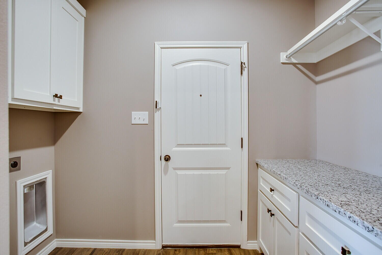 1405 16th Street, Unit A Shallowater, TX 79363 - Photo 10 of 17 a view of hallway with washer and dryer