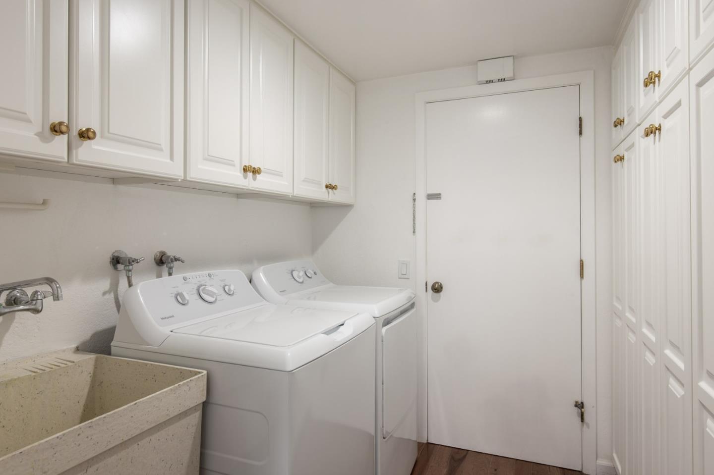 2972 Cormorant Road Pebble Beach, CA 93953 - Photo 14 of 26 a utility room with dryer and washer