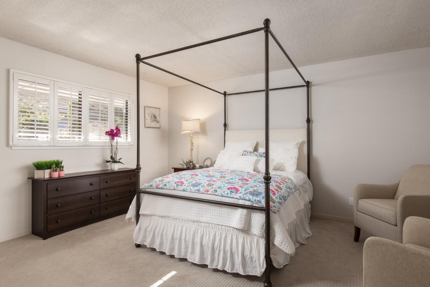 2972 Cormorant Road Pebble Beach, CA 93953 - Photo 18 of 26 a bedroom with a bed window and a dresser