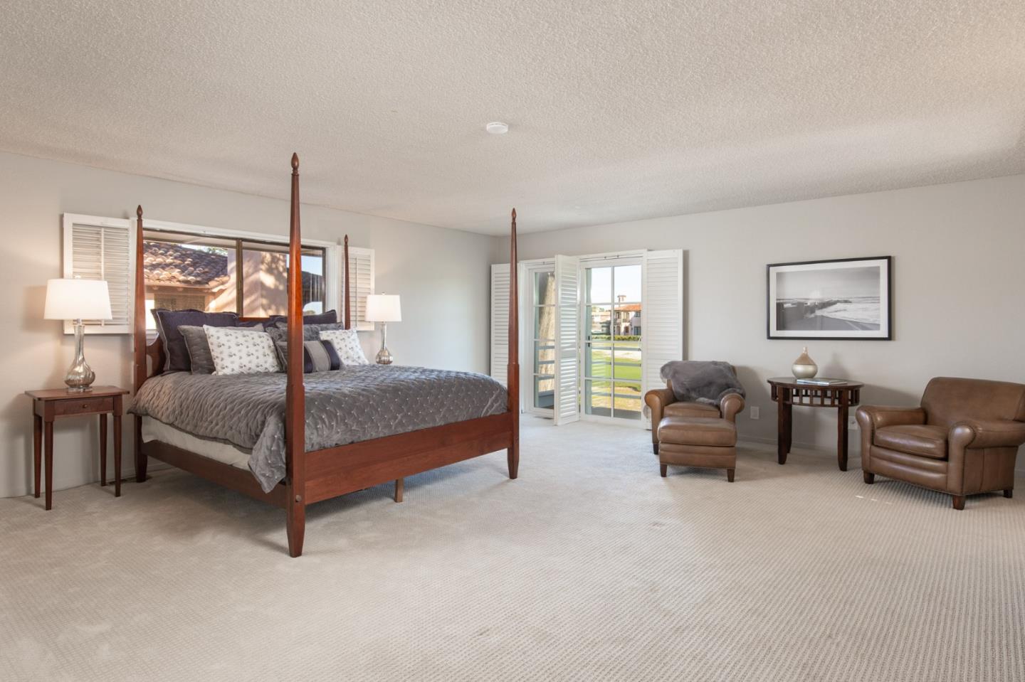 2972 Cormorant Road Pebble Beach, CA 93953 - Photo 20 of 26 a bedroom with a bed couch and a window