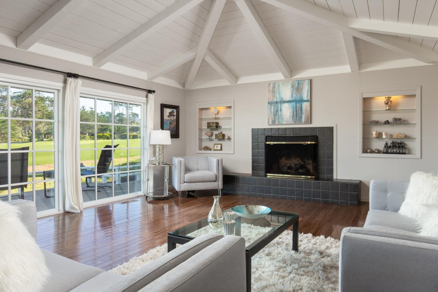 2972 Cormorant Road Pebble Beach, CA 93953 - Photo 4 of 26 a living room with furniture and a fireplace