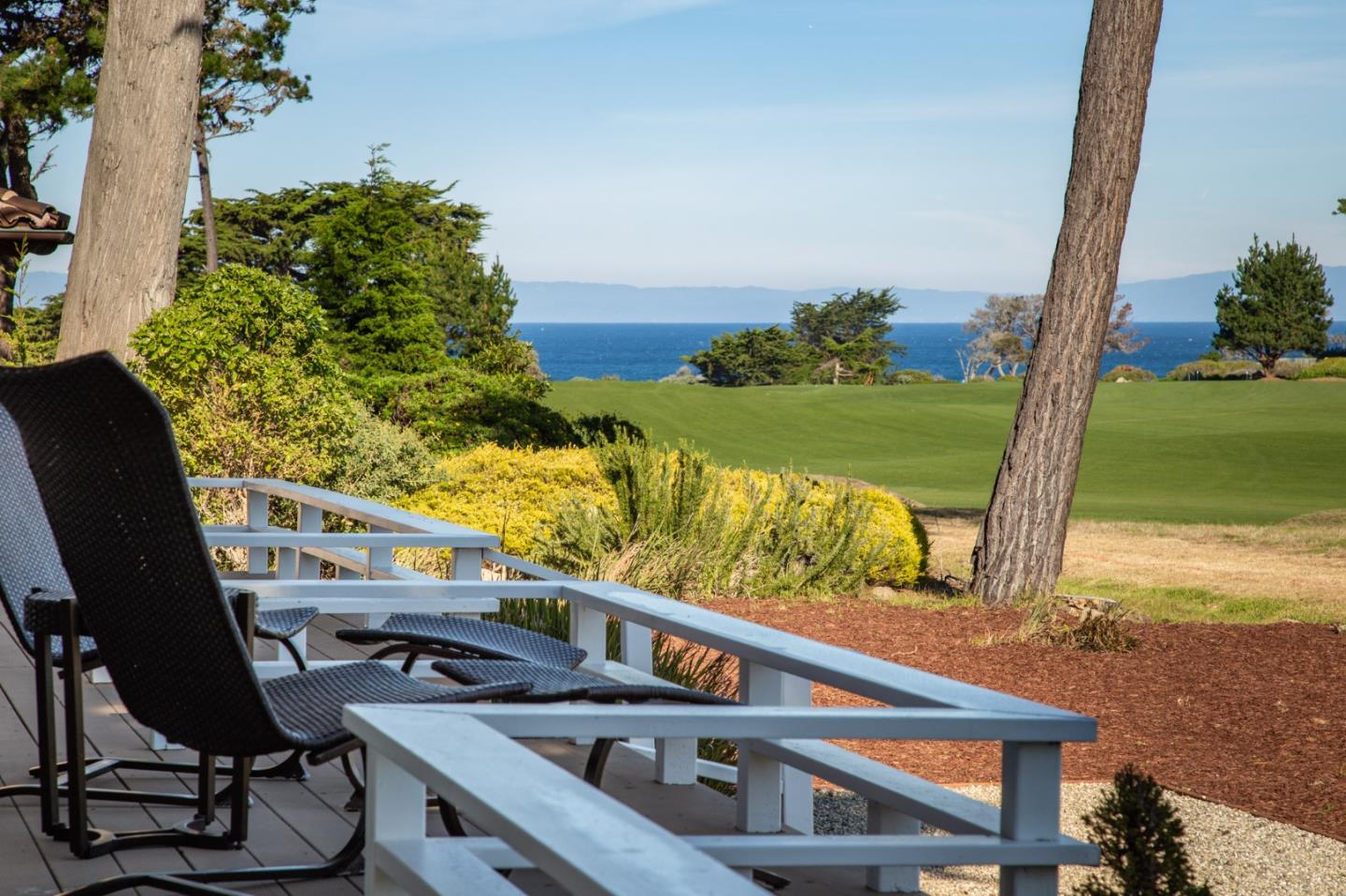 2972 Cormorant Road Pebble Beach, CA 93953 - Photo 9 of 26 a view of a balcony with chair and wooden floor