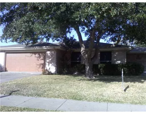 a view of house with yard