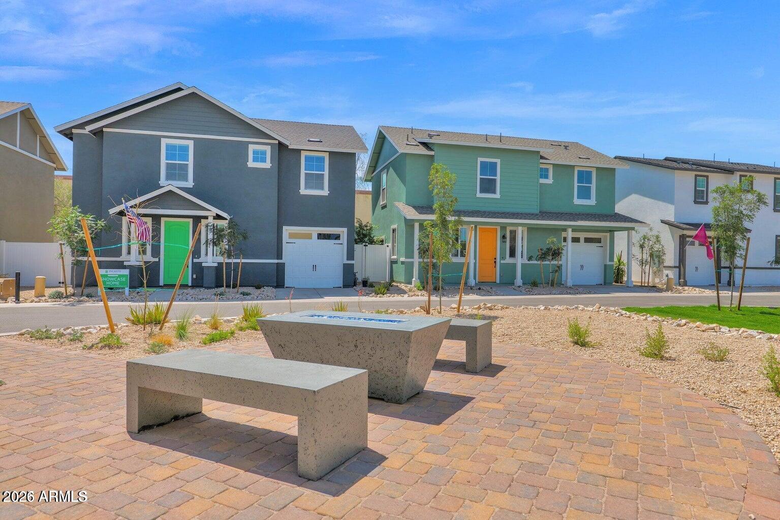 16874 North 12th Street, Unit 4 Phoenix, AZ 85022 - Photo 15 of 20 a view of an house with swimming pool and a chairs in porch
