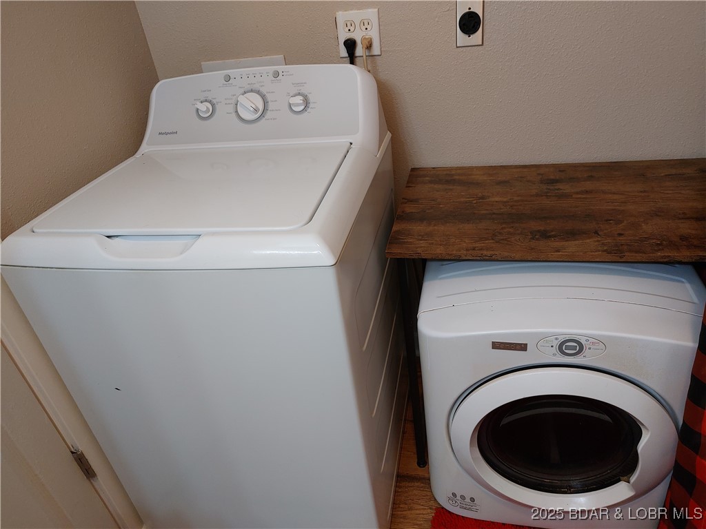 34246 Rabbit Run Road Stover, MO 65078 - Photo 11 of 17 Washer & dryer in full bathroom