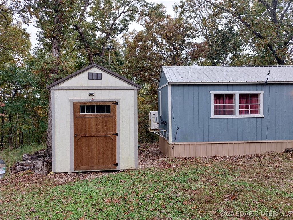 34246 Rabbit Run Road Stover, MO 65078 - Photo 14 of 17 Storage shed included and showing new MiniSplit fo