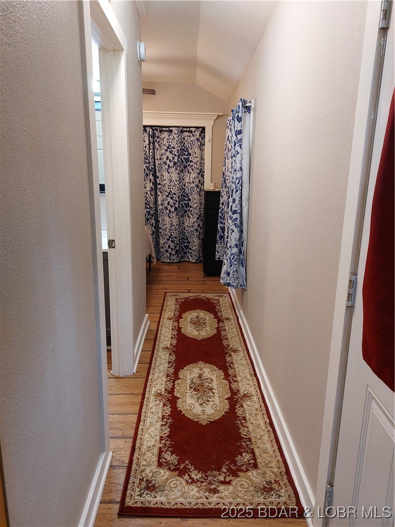 34246 Rabbit Run Road Stover, MO 65078 - Photo 9 of 17 hallway to bedroom, full bath with washer & dryer