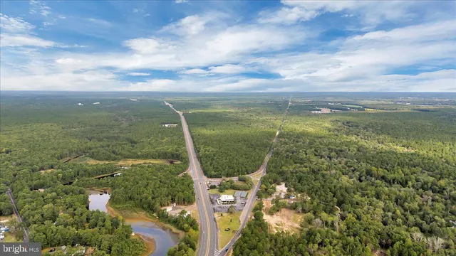 a view of a yard with an outdoor seating