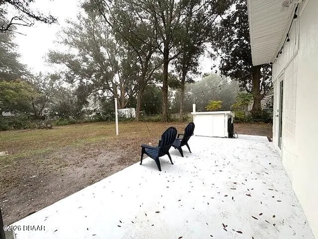 a view of a yard with furniture