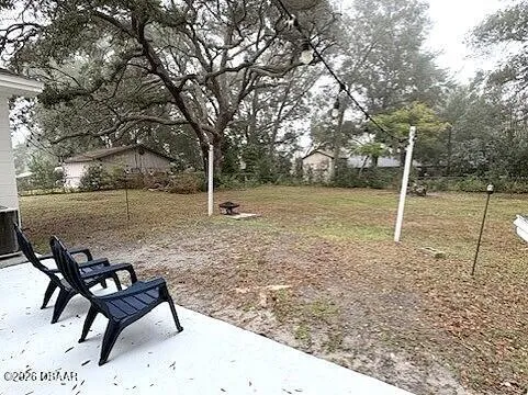 a house with trees in the background