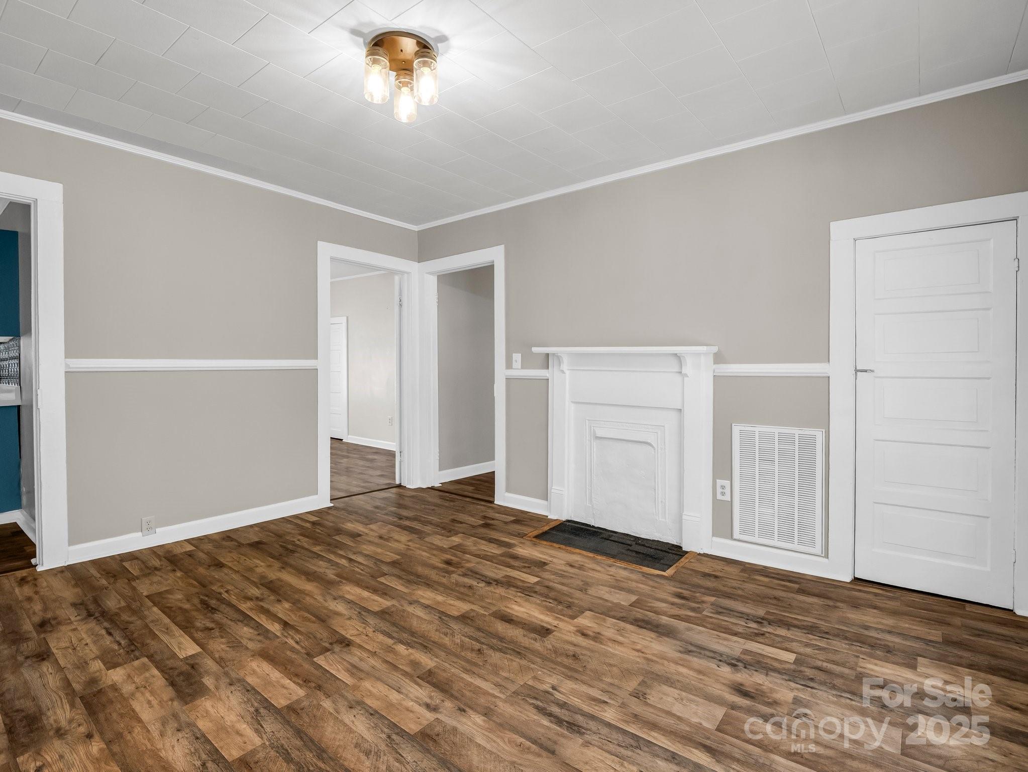 149 Wisconsin Street Spindale, NC 28160 - Photo 12 of 23 a view of empty room with wooden floor