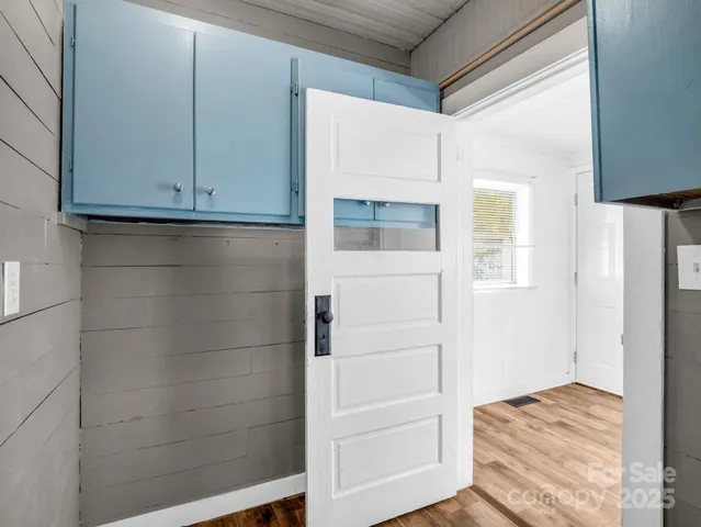 a room with a sink and a window