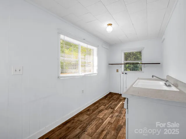 a view of workspace with large windows and yard