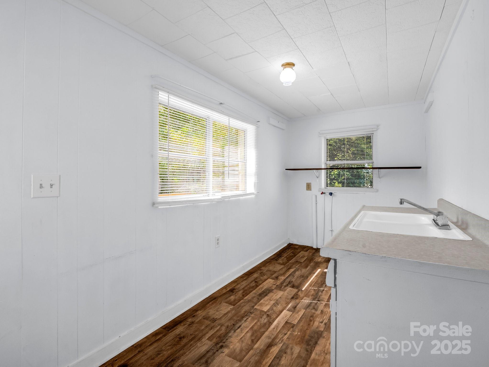 149 Wisconsin Street Spindale, NC 28160 - Photo 19 of 23 a room with a sink and a window
