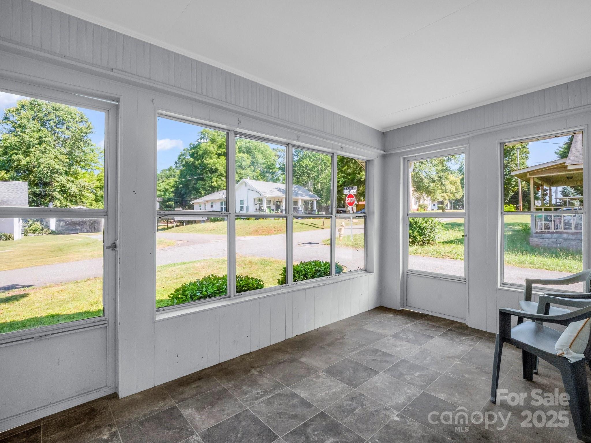 149 Wisconsin Street Spindale, NC 28160 - Photo 20 of 23 a view of workspace with large windows and yard