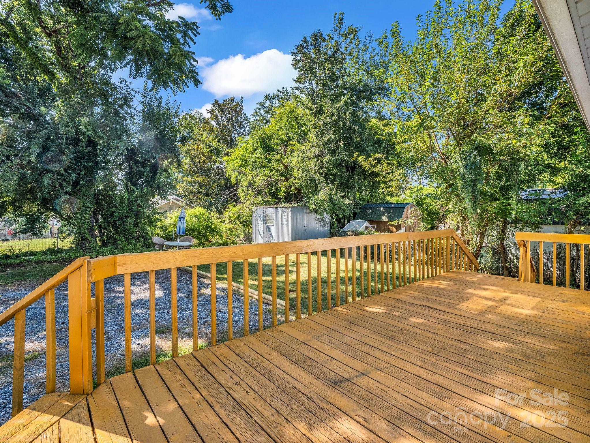 149 Wisconsin Street Spindale, NC 28160 - Photo 21 of 23 a view of balcony with wooden floor and fence