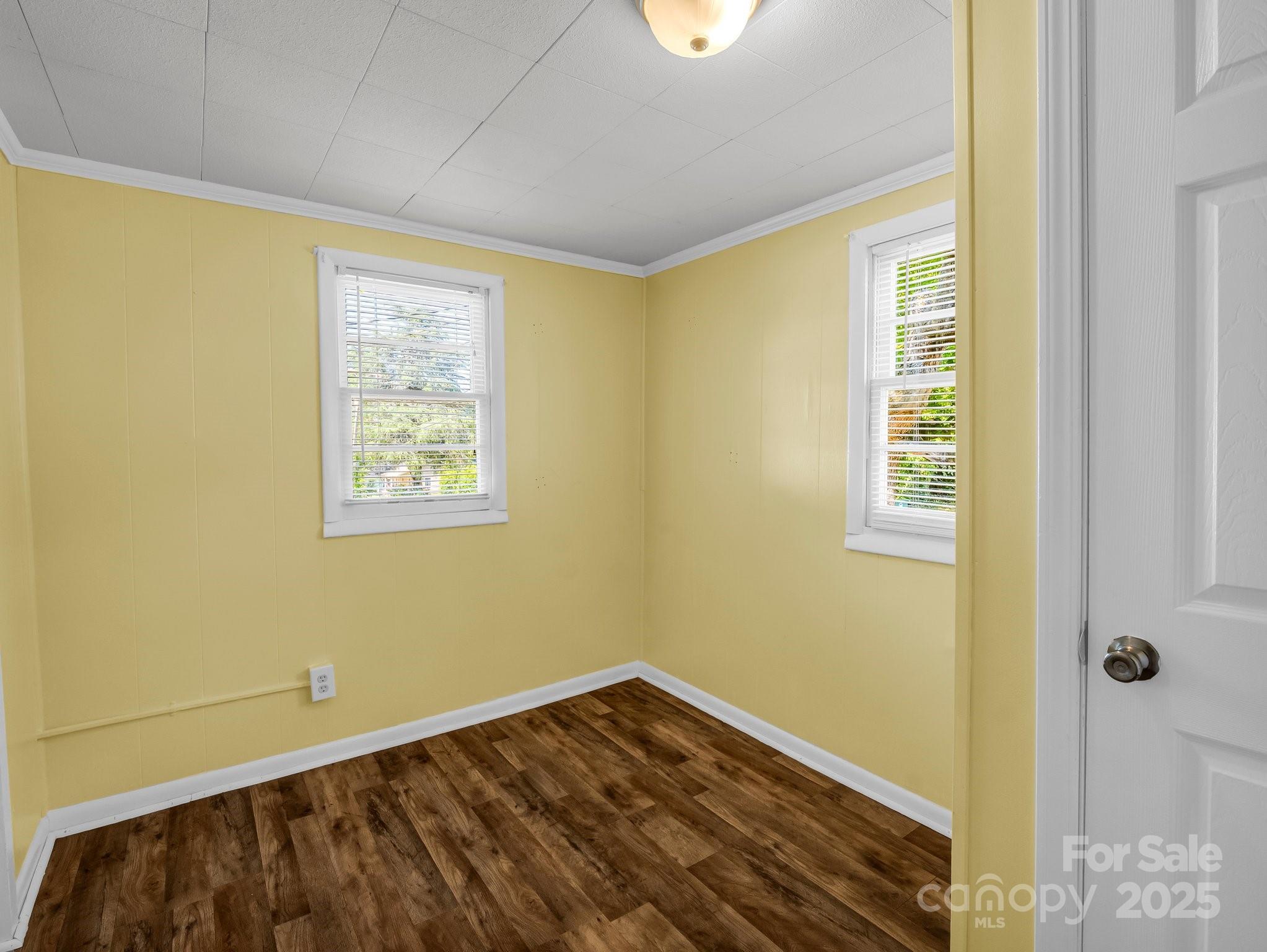 149 Wisconsin Street Spindale, NC 28160 - Photo 9 of 23 a view of a room with wooden floor and a window