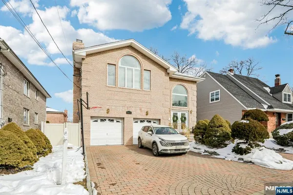 a view of a street with cars