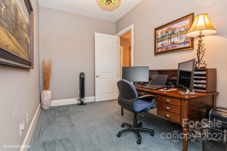 9517 Wheatfield Road Charlotte, NC 28277 - Photo 20 of 41 a view of a workspace with furniture and a window
