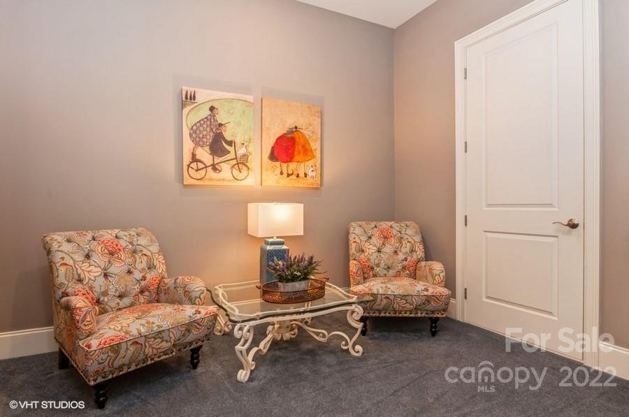 9517 Wheatfield Road Charlotte, NC 28277 - Photo 21 of 41 a living room with furniture and a couch