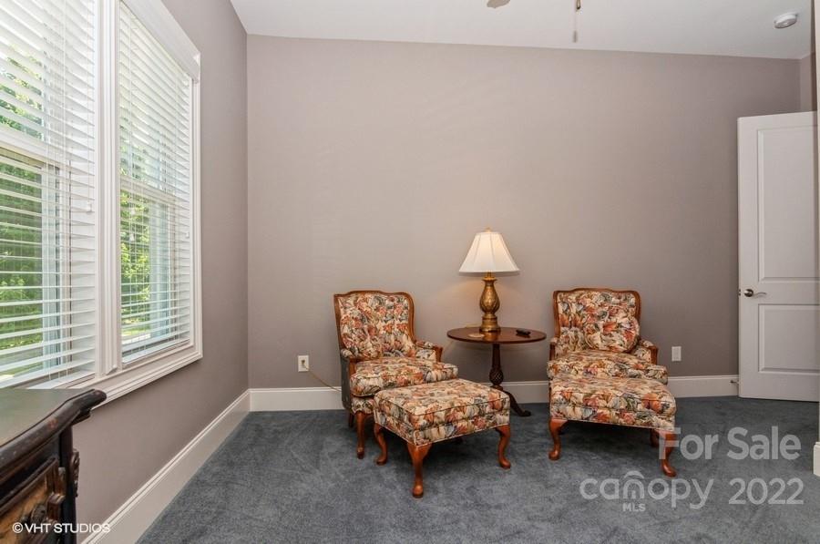 9517 Wheatfield Road Charlotte, NC 28277 - Photo 32 of 41 a living room with furniture and a window