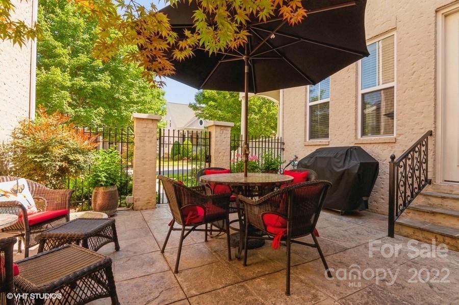 9517 Wheatfield Road Charlotte, NC 28277 - Photo 36 of 41 a view of a patio with furniture and backyard