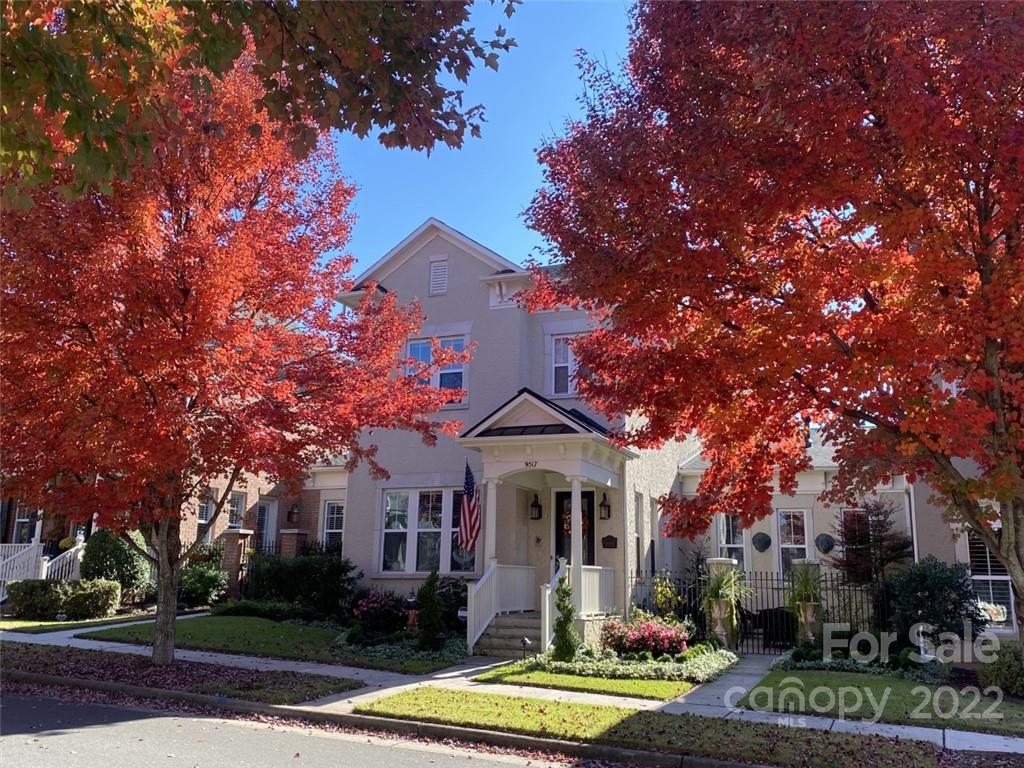 9517 Wheatfield Road Charlotte, NC 28277 - Photo 6 of 41 a front view of a house with a yard