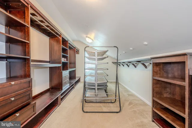a view of an empty walk in closet