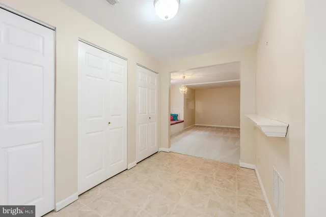 an empty room with an entryway