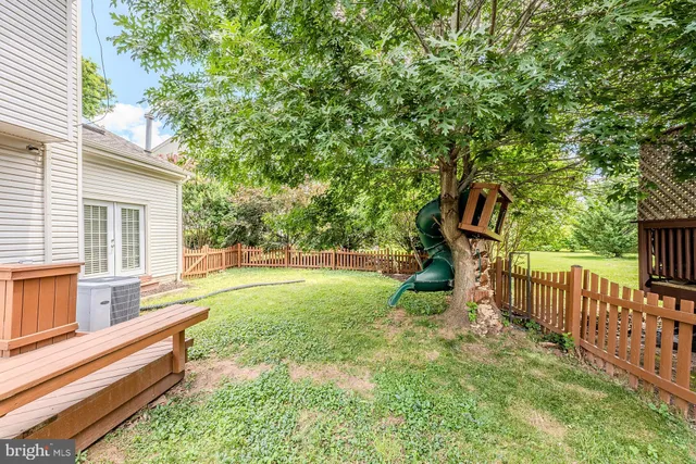 a view of a garden with a slide