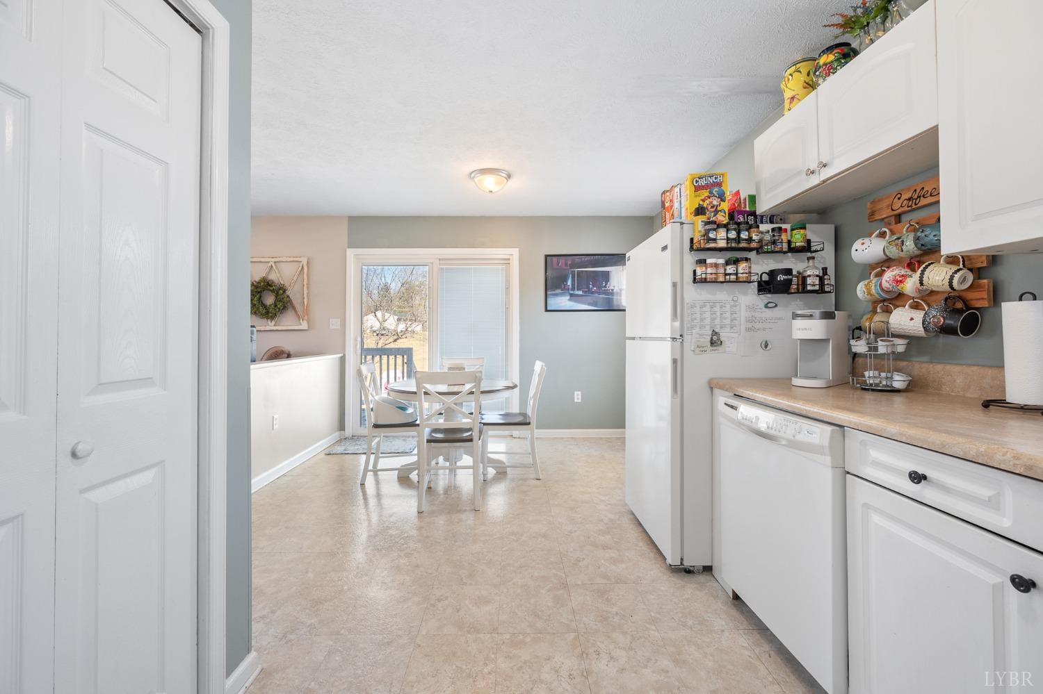 360 Webster Drive Concord, VA 24538 - Photo 14 of 36 a kitchen with stainless steel appliances granite countertop a sink and cabinets