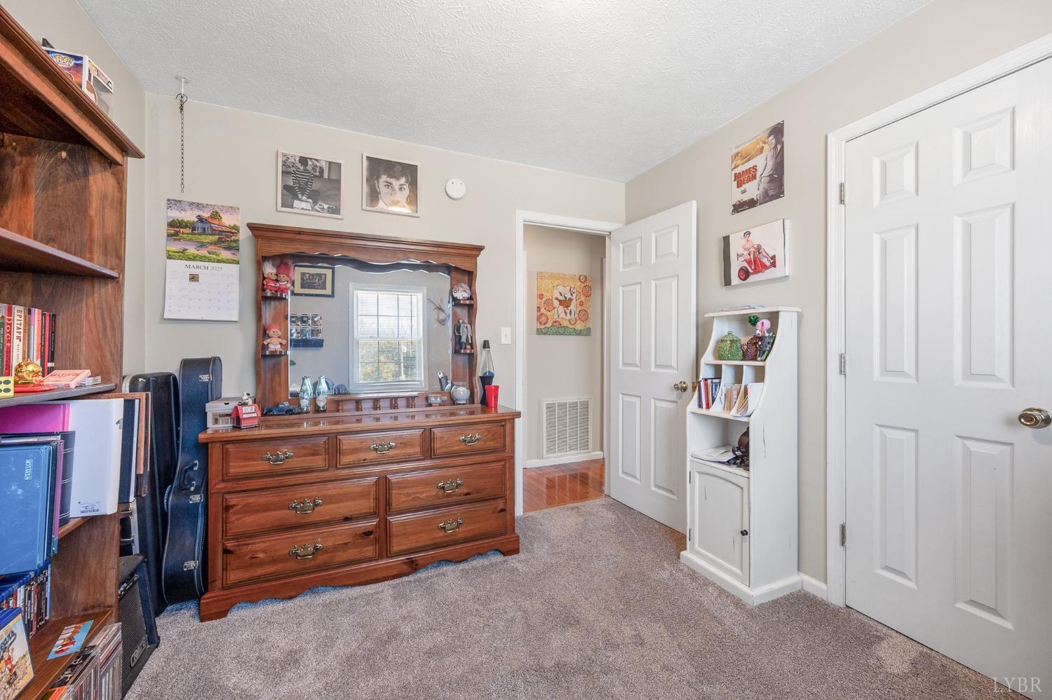 360 Webster Drive Concord, VA 24538 - Photo 17 of 36 a room with furniture and a dresser