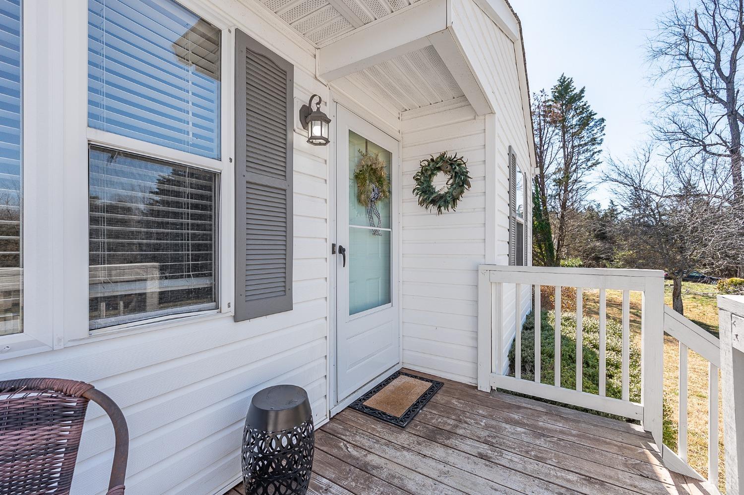 360 Webster Drive Concord, VA 24538 - Photo 2 of 36 a view of a porch with furniture and wooden floor