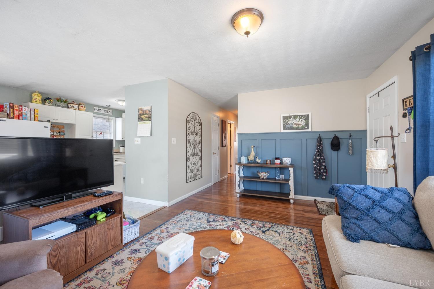 360 Webster Drive Concord, VA 24538 - Photo 7 of 36 a living room with furniture and a flat screen tv